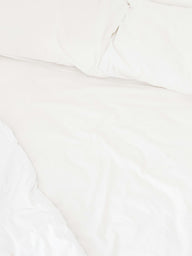 Fresh white bed linen